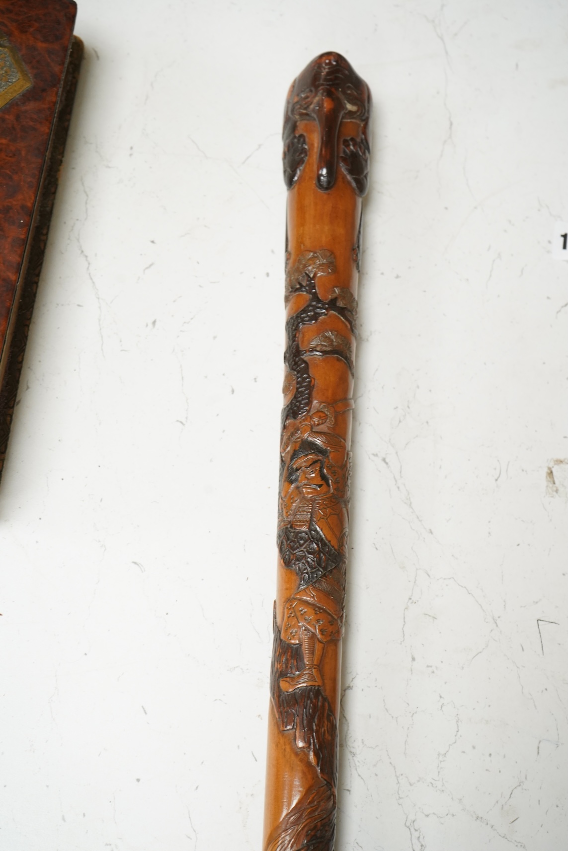 A late 19th century Japanese carved walking stick, with elephant handle, 95cm high